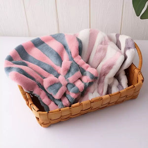 Hair towel wraps in a basket