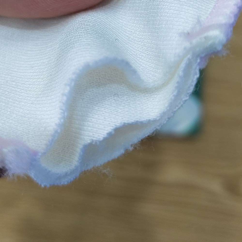Close-up of soft bamboo-cotton makeup remover pad fabric