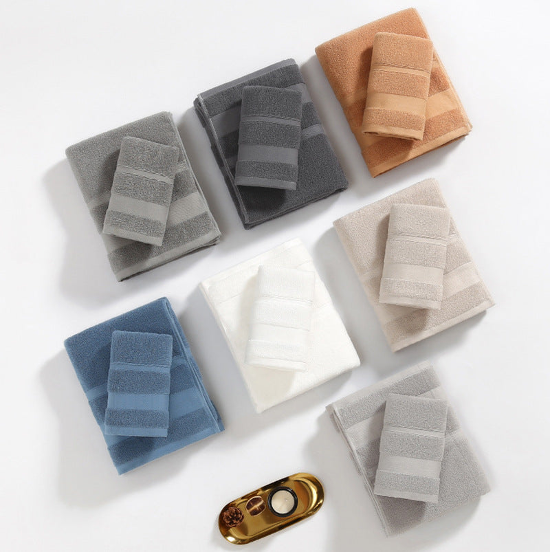 Cotton towel sets shown in assorted colours
