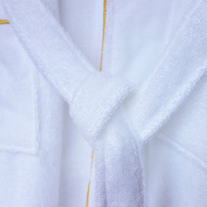 Close-up of bathrobe collar and knotted tie belt